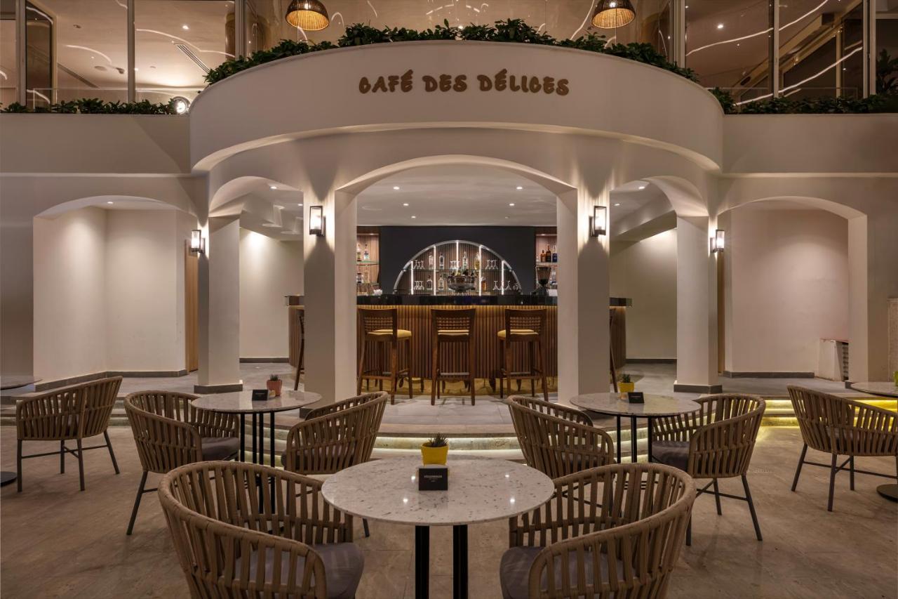 施泰根博阁尼罗河宫殿酒店 樂蜀 外观 照片 Café des Délices